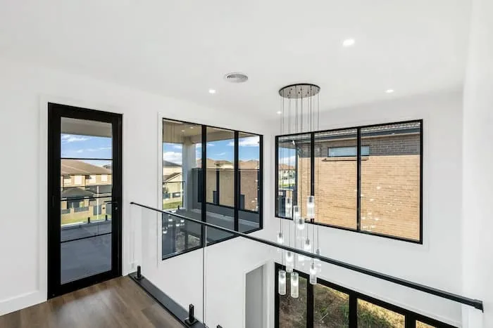 Modern upper floor with glass railing,