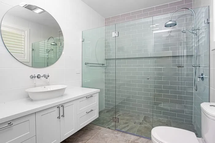 Green tiled shower bathroom