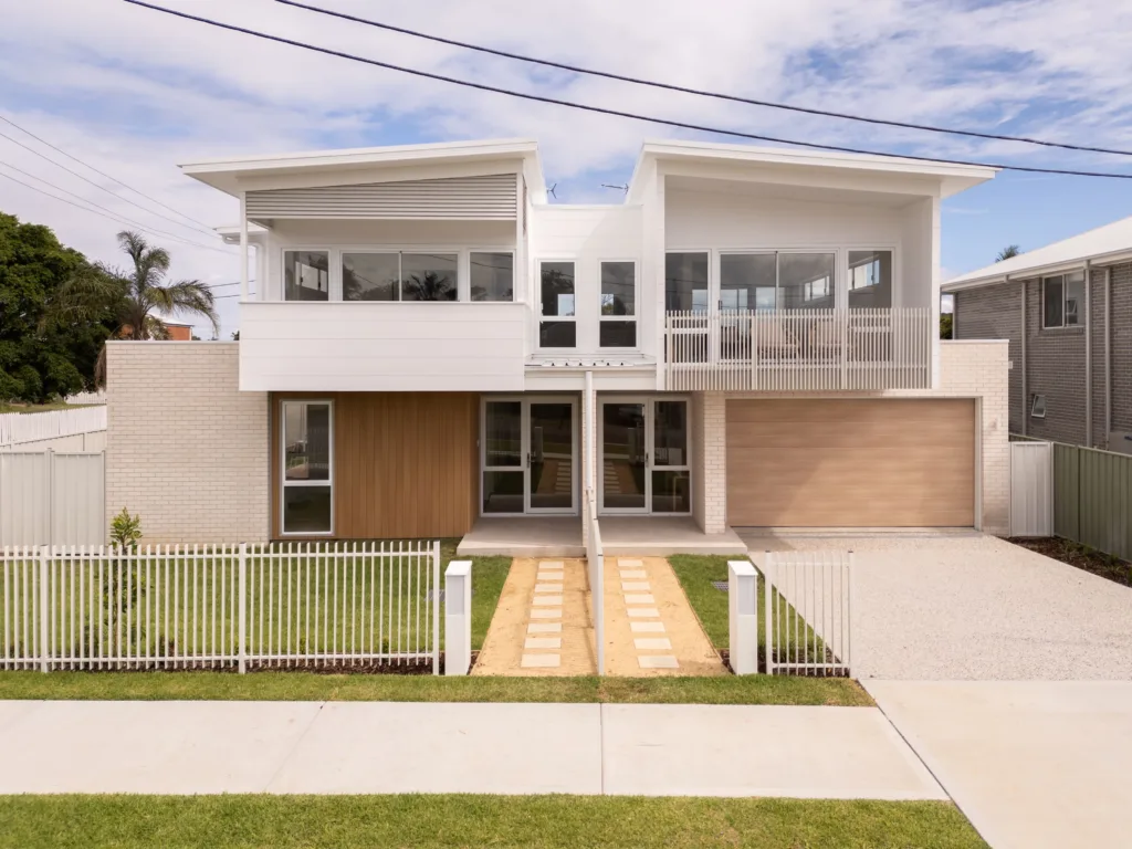 Modern white duplex home