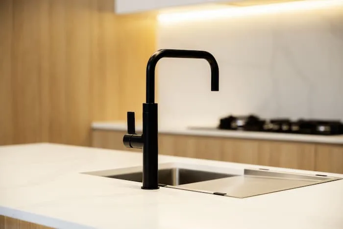 Black kitchen tap fixture