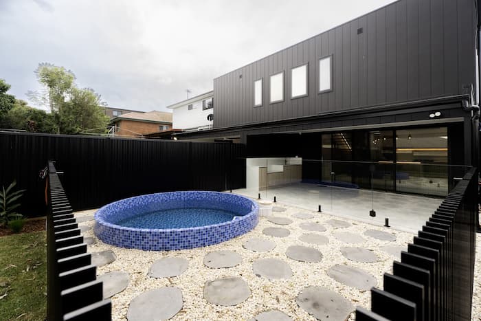 Round mosaic backyard pool