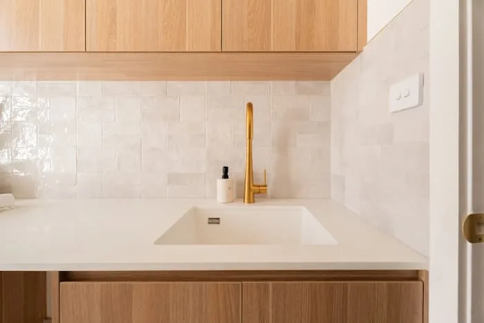 Gold tap kitchen sink