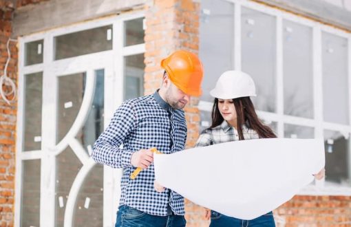Engineers Reviewing Blueprints